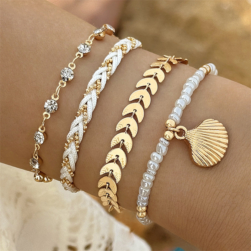 Bracciale con conchiglie dorate elegante